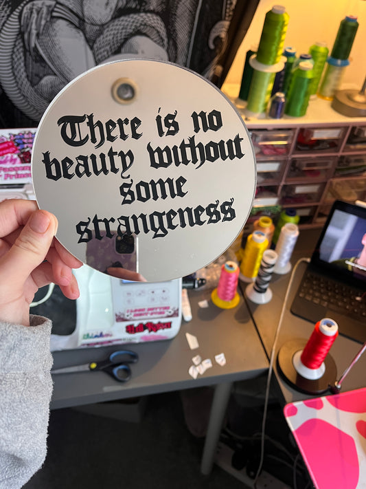 There Is No Beauty Without Some Strangeness Mirror