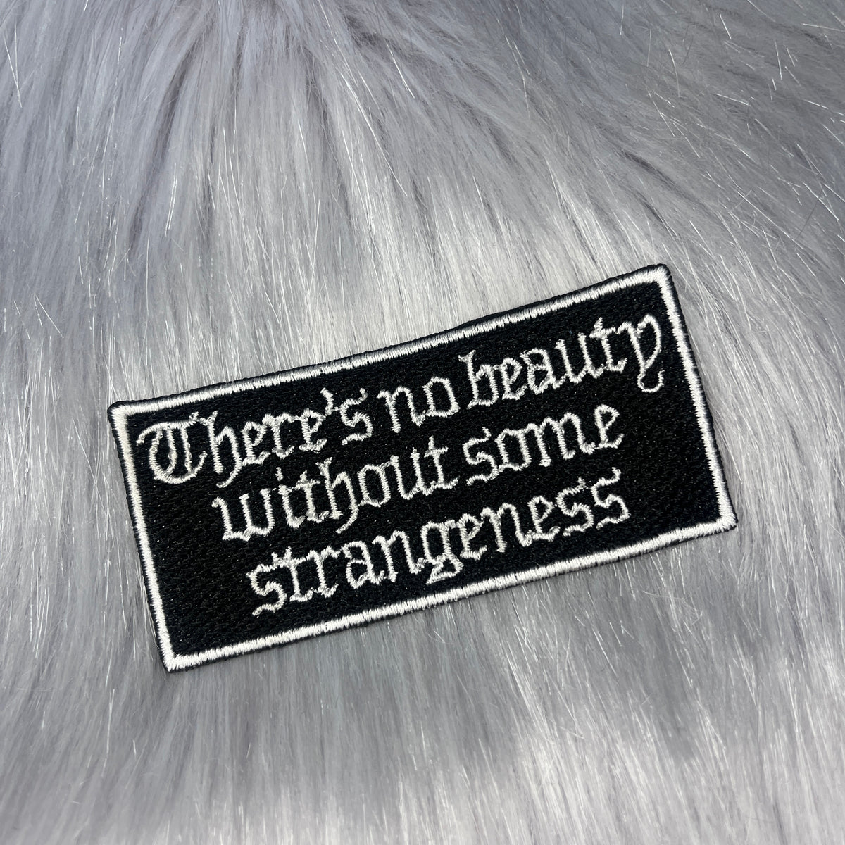 There's No Beauty Without Some Strangeness Embroidered Patch