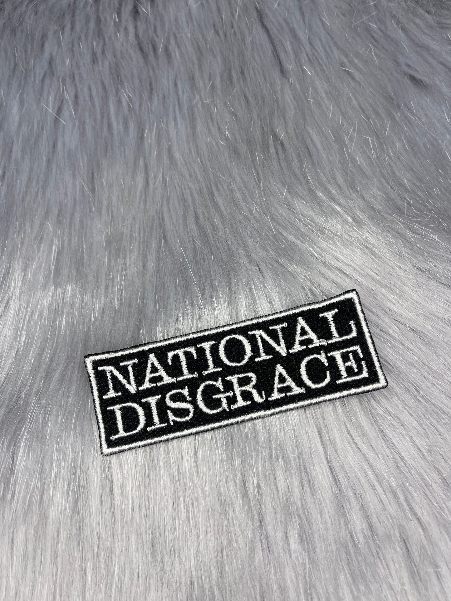 National Disgrace Embroidered Patch