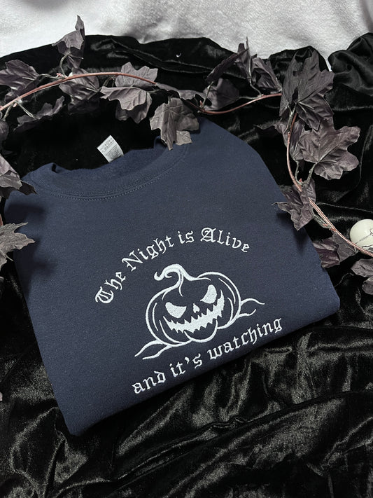 The Night Is Alive And It's Watching Pumpkin Sweatshirt