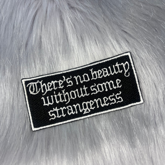 There's No Beauty Without Some Strangeness Embroidered Patch